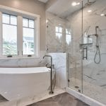Free standing white tub and Rocky Knoll Glass shower enclosure